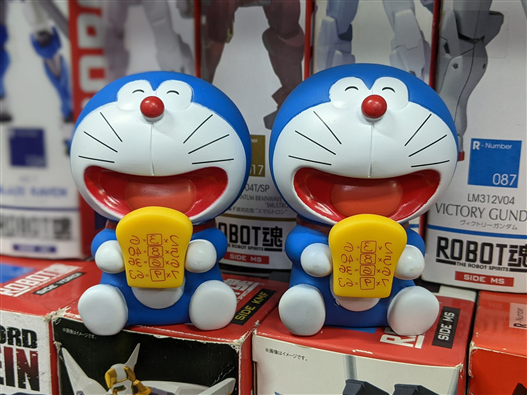 Mua bán PVC DORAEMON CẦM BÁNH MÌ TRÍ NHỚ NO BOX