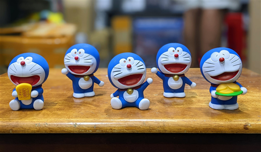 Mua bán PVC DORAEMON CẦM BÁNH MÌ TRÍ NHỚ NO BOX